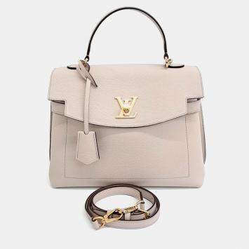 Pre Owned Louis Vuitton Beige Leather Lockme Ever MM