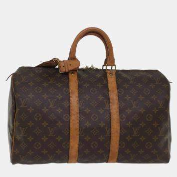 Used louis discount vuitton duffle bag