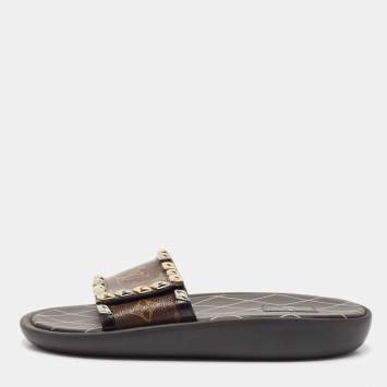 Pre Owned Louis Vuitton Monogram Canvas and Studded Leather Eldorado Flat Slides Size 39