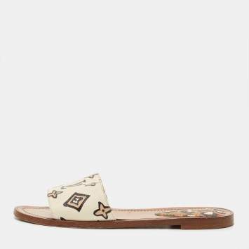 Pre Owned Louis Vuitton Cream Monogram Embossed Leather Revival Flat Slides Size 37