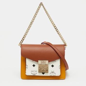 مملوكة مسبقًا حقيبة كروس إم سي إم بطرسية صغيرة قماش مقوى ملونة متعددة وجلد