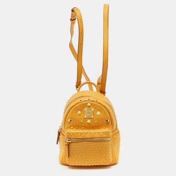 Pre Owned MCM Stark Mini Yellow Leather Studded Backpack