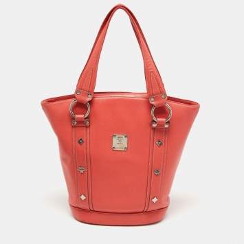 Pre Owned MCM Orange Pebbled Leather Studded Tote