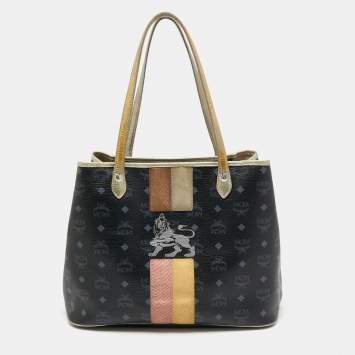 Pre Owned MCM Dark Blue/Gold Visetos Coated Canvas Princess Lion Shopper Tote