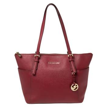 Pre Owned MICHAEL Michael Kors Red Leather Medium Jet Set Top Zip Tote