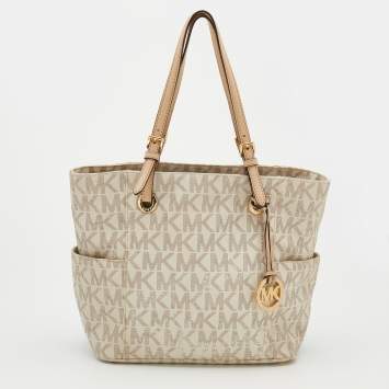 Pre Owned MICHAEL Michael Kors Off White/Beige Signature Coated Canvas and Leather Jet Set East West Tote