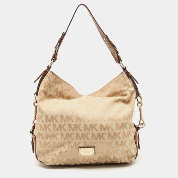 Pre Owned Michael Michael Kors Beige/Brown Signature Canvas and Leather Studded Hobo