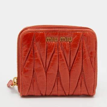 Pre Owned Miu Miu Orange Matelassé Leather Zip Around Compact Wallet