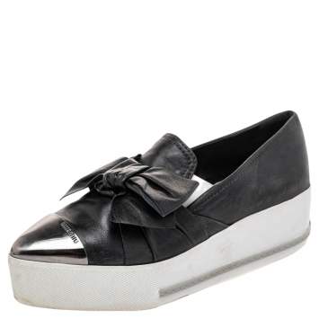 Pre Owned Miu Miu Black Leather Knot Bow Skate Metal Cap Toe Slip On Sneakers Size 38