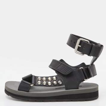 Pre Owned Prada Black Leather and Rubber Punk Stud Ankle Strap Flat Sandals Size 37.5