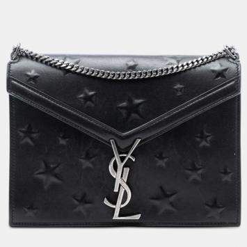 مملوكة مسبقًا Saint Laurent Paris Black Star Embossed Calfskin Monogram Cassandra Clasp Bag