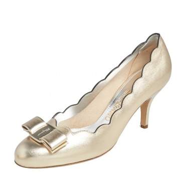 Pre Owned Salvatore Ferragamo Gold Leather Carla Vara Bow Pump Size 37