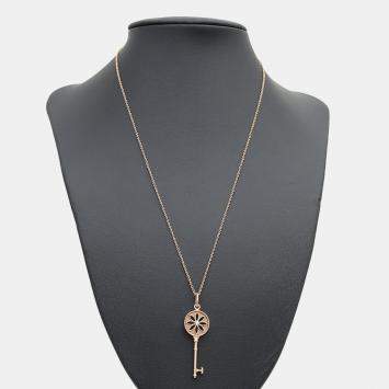 Pre Owned Tiffany & Co. 18K Yellow Gold 0.04 Ct Diamond Daisy Key Pendant Necklace