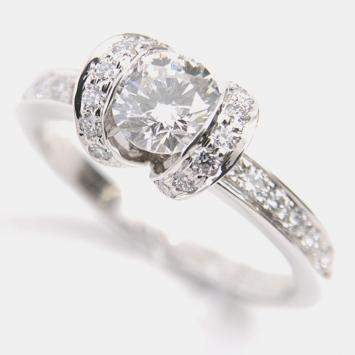 Pre Owned Tiffany & Co. Platinum and Diamond Ribbon Solitaire Ring EU 50