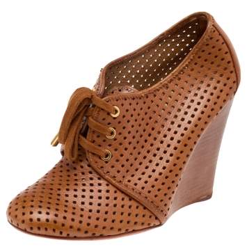 Pre Owned Tory Burch Brown Perforated Leather Wedge Sneakers Size 38.5
