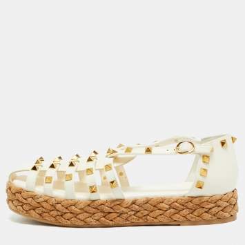 مملوكة مسبقًا صندل فالنتينو فلات روكستد جلد كريمي كورك مقاس 38