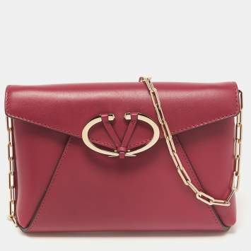 Pre Owned Valentino Dark Pink Leather V Rivet Clutch Bag