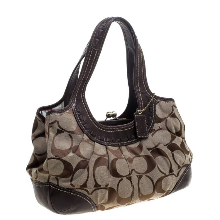Pre Owned Coach Beige/Brown Signature Canvas and Leather Kiss Lock Shoulder Bag 