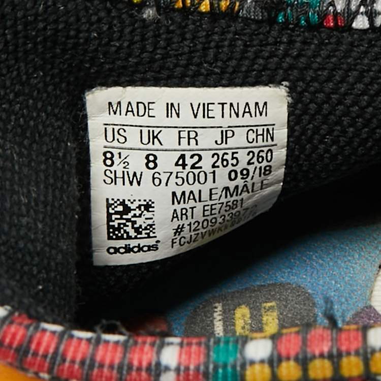 Pre Owned حذاء رياضي فاريل وأديداس هيومان ريس أحمر مقاس 42