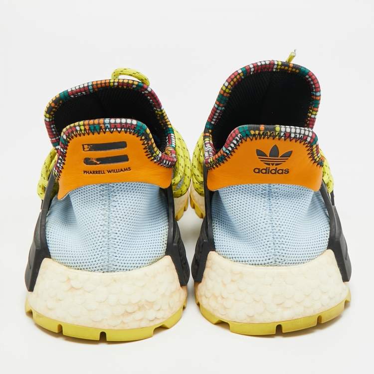 Pre Owned حذاء رياضي فاريل وأديداس هيومان ريس أحمر مقاس 42