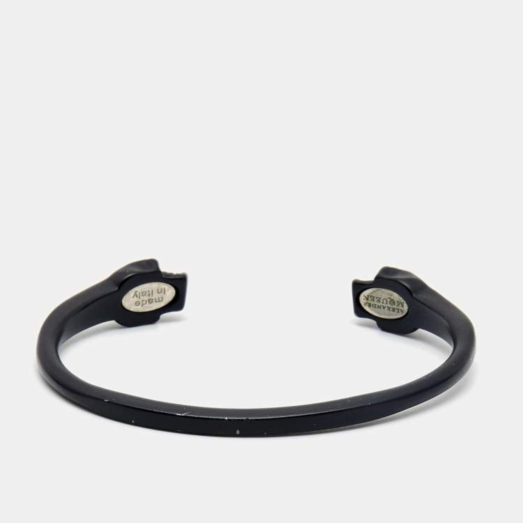 Pre Owned Alexander McQueen Black Tone Twin Skull Motif Open Cuff Bracelet
