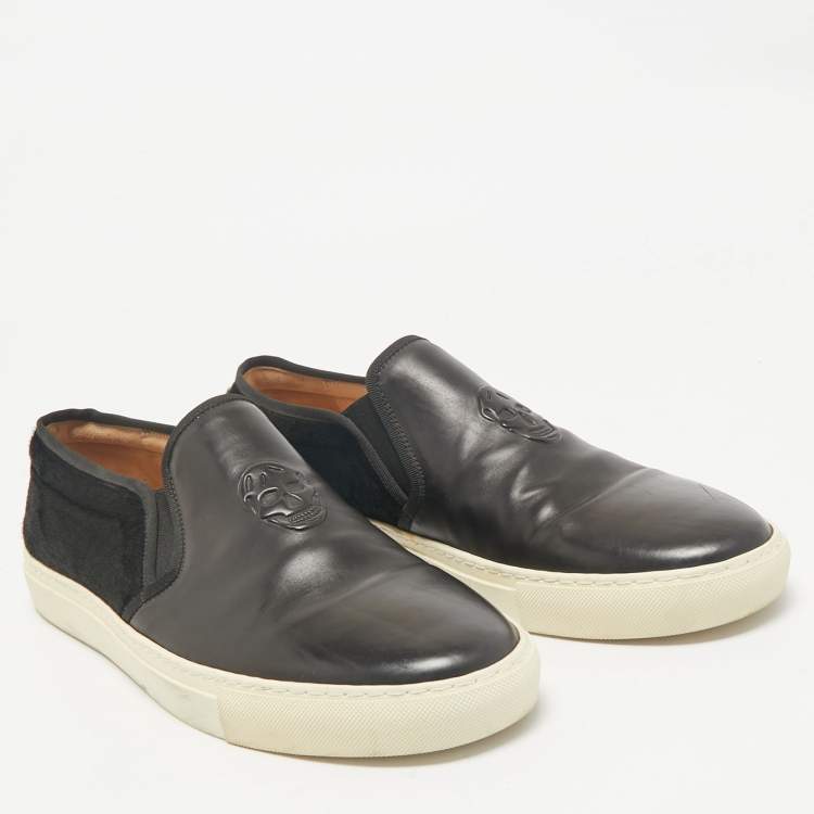 Pre Owned Alexander McQueen Black Leather and Calf Hair Skull Logo Embossed Slip On Sneakers Size 45