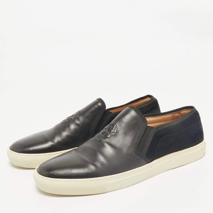 Pre Owned Alexander McQueen Black Leather and Calf Hair Skull Logo Embossed Slip On Sneakers Size 45