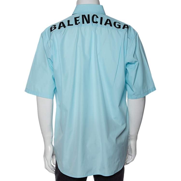 Pre Owned Balenciaga Light Blue Cotton Logo Print Detailed Short Sleeve Oversized Shirt S