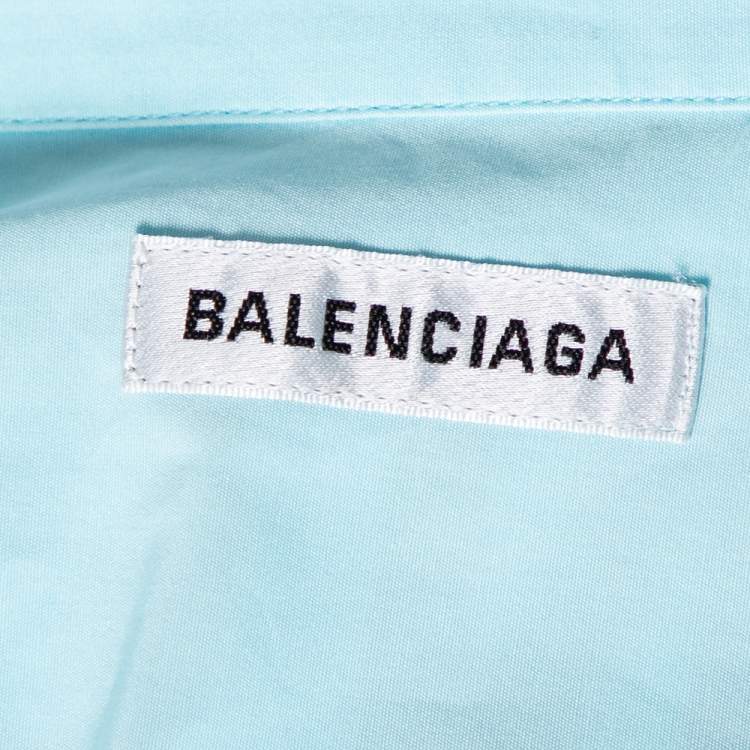 Pre Owned Balenciaga Light Blue Cotton Logo Print Detailed Short Sleeve Oversized Shirt S