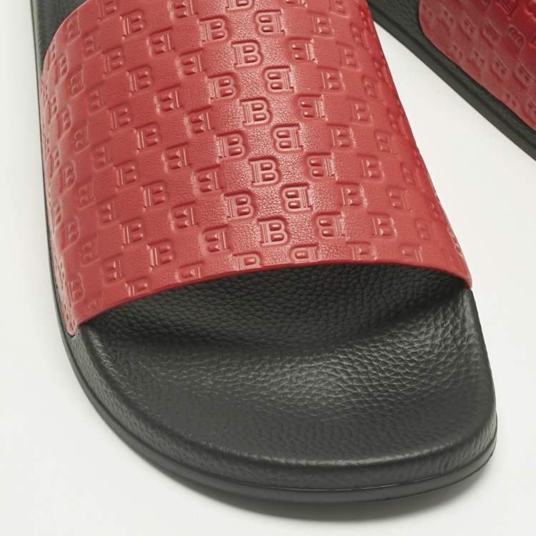 Pre Owned Balmain Red Monogram Embossed Leather Slide Sandals Size 44