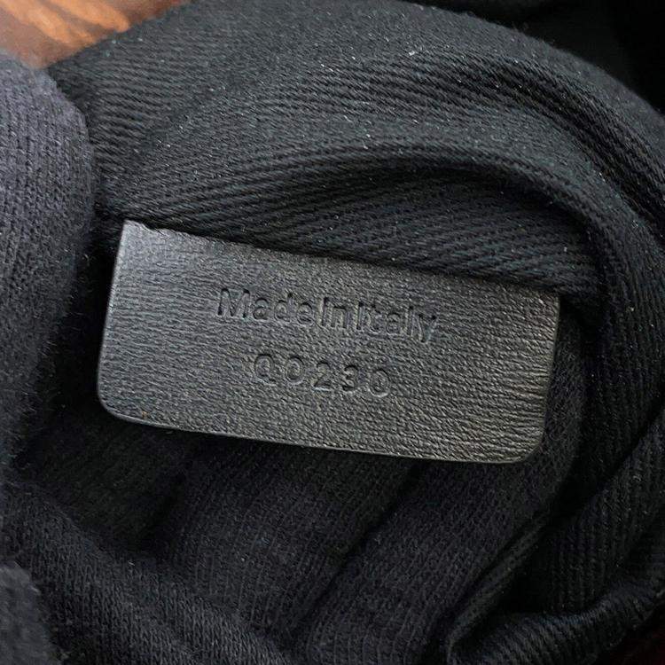 مملوكة مسبقًا حقيبة سفر برلوتي توقيع بطريقتين جلد أسود