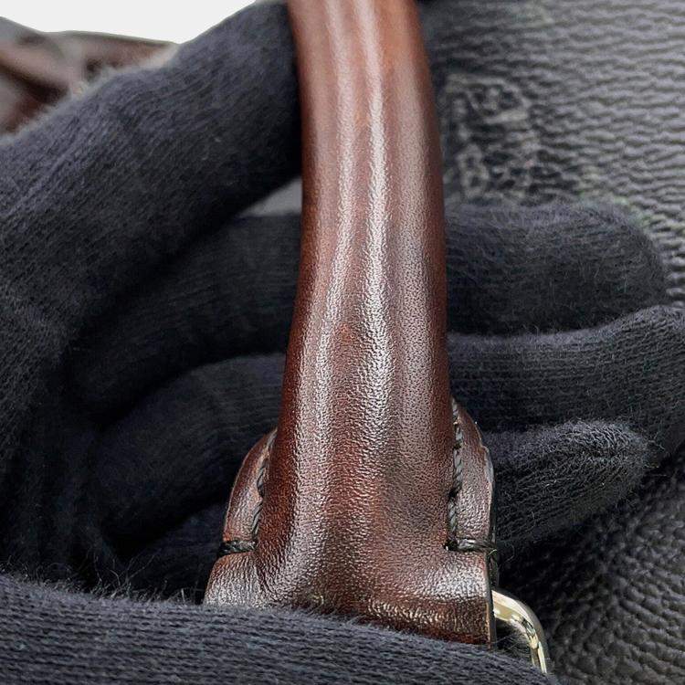 مملوكة مسبقًا حقيبة سفر برلوتي توقيع بطريقتين جلد أسود