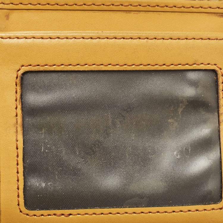 Pre Owned Burberry Brown/Yellow Smoke Check Coated Canvas and Leather Bifold Wallet