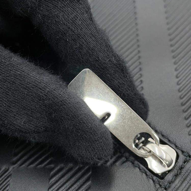 Pre Owned Burberry Embossed Check Black Calf Leather Messenger Bag