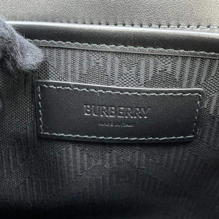 Pre Owned Burberry Embossed Check Black Calf Leather Messenger Bag