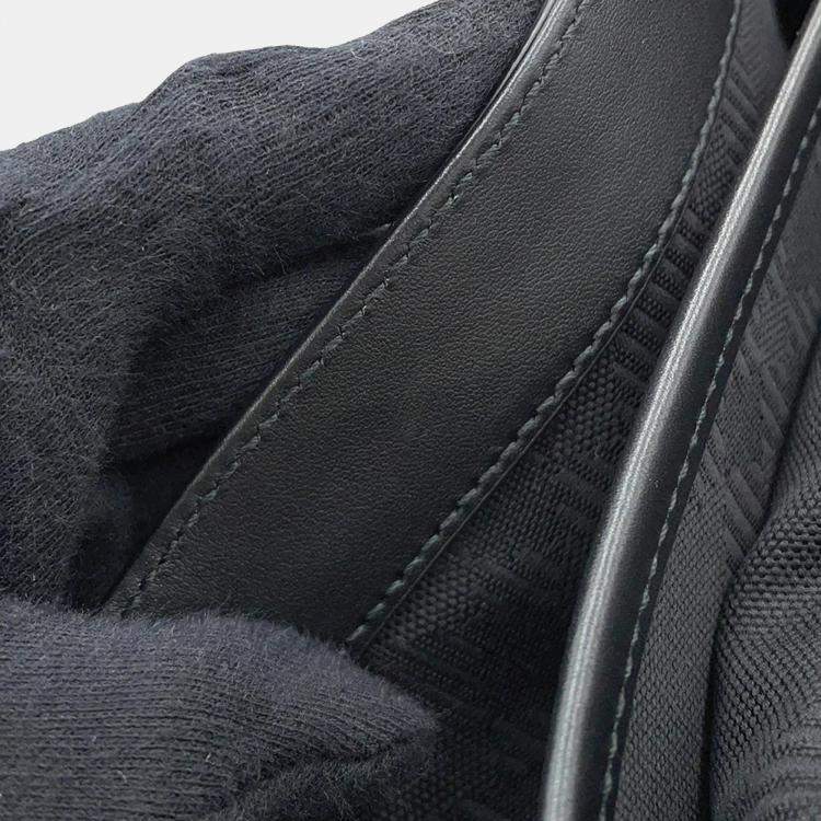 Pre Owned Burberry Embossed Check Black Calf Leather Messenger Bag