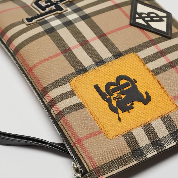 Pre Owned Burberry Beige/Black House Check PVC and Leather Patchwork Wristlet Pouch