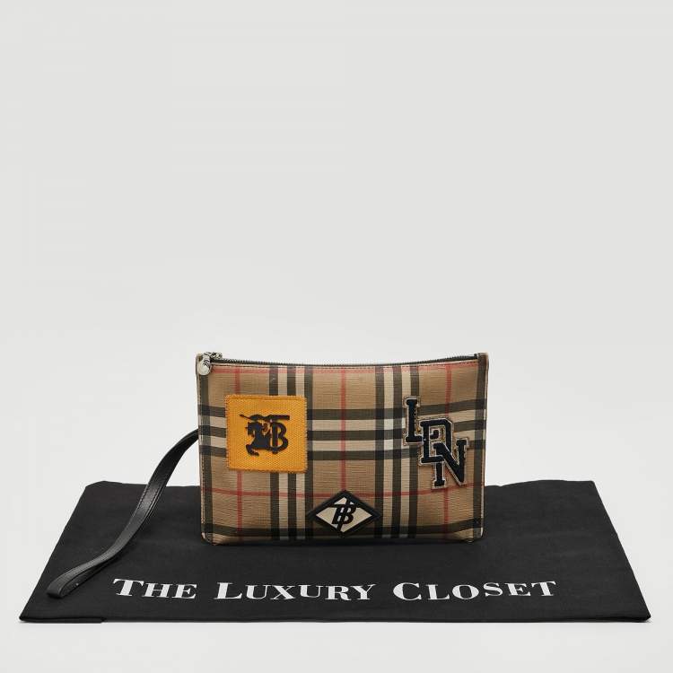 Pre Owned Burberry Beige/Black House Check PVC and Leather Patchwork Wristlet Pouch