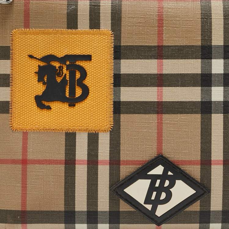 Pre Owned Burberry Beige/Black House Check PVC and Leather Patchwork Wristlet Pouch