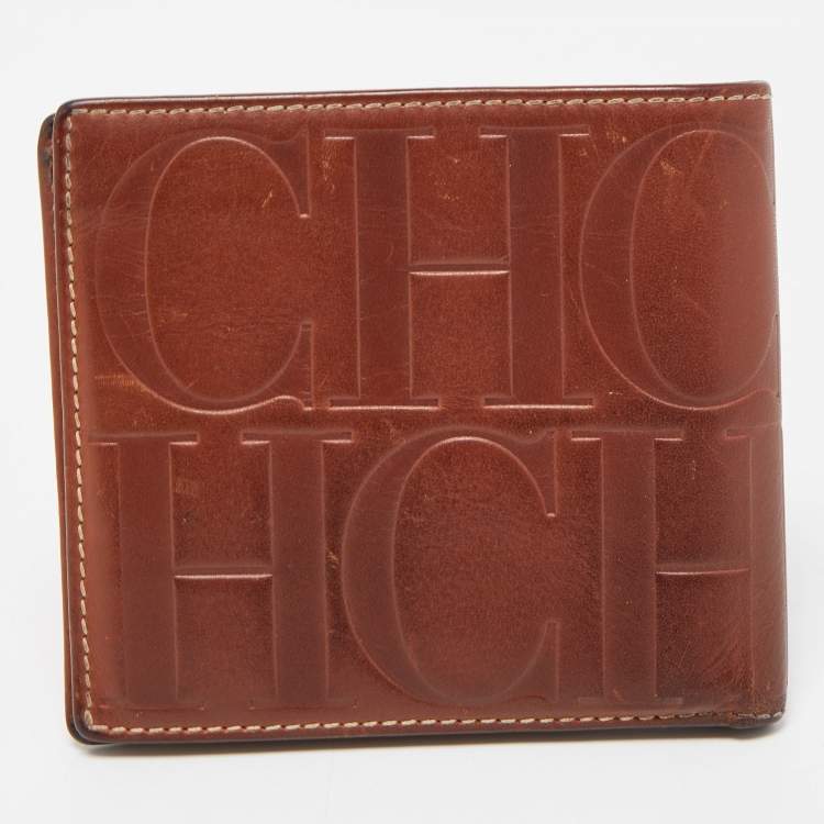 Pre Owned Carolina Herrera Brown Monogram Embossed Leather Bifold Wallet