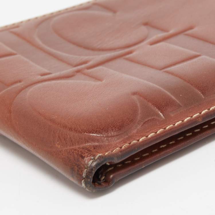 Pre Owned Carolina Herrera Brown Monogram Embossed Leather Bifold Wallet