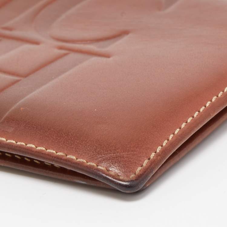 Pre Owned Carolina Herrera Brown Monogram Embossed Leather Bifold Wallet