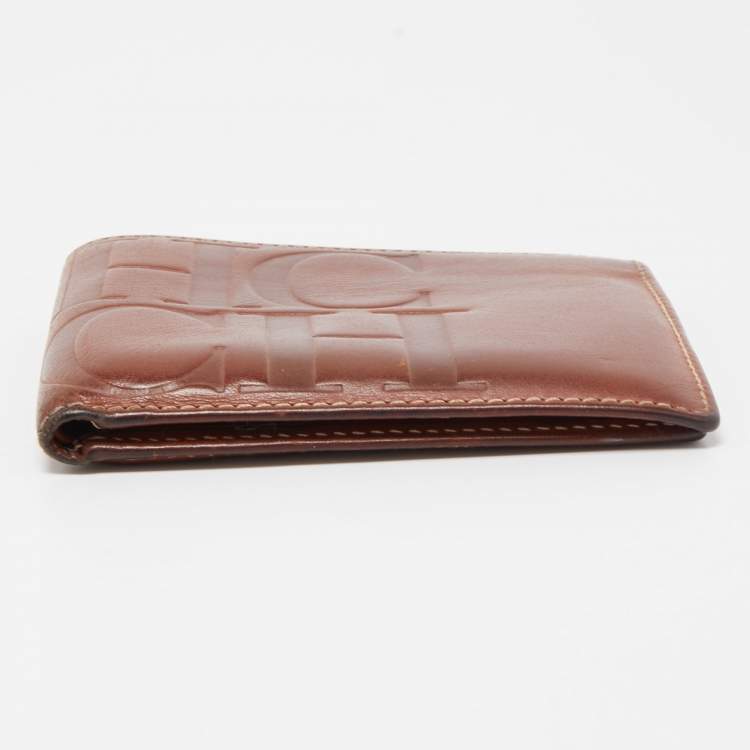 Pre Owned Carolina Herrera Brown Monogram Embossed Leather Bifold Wallet