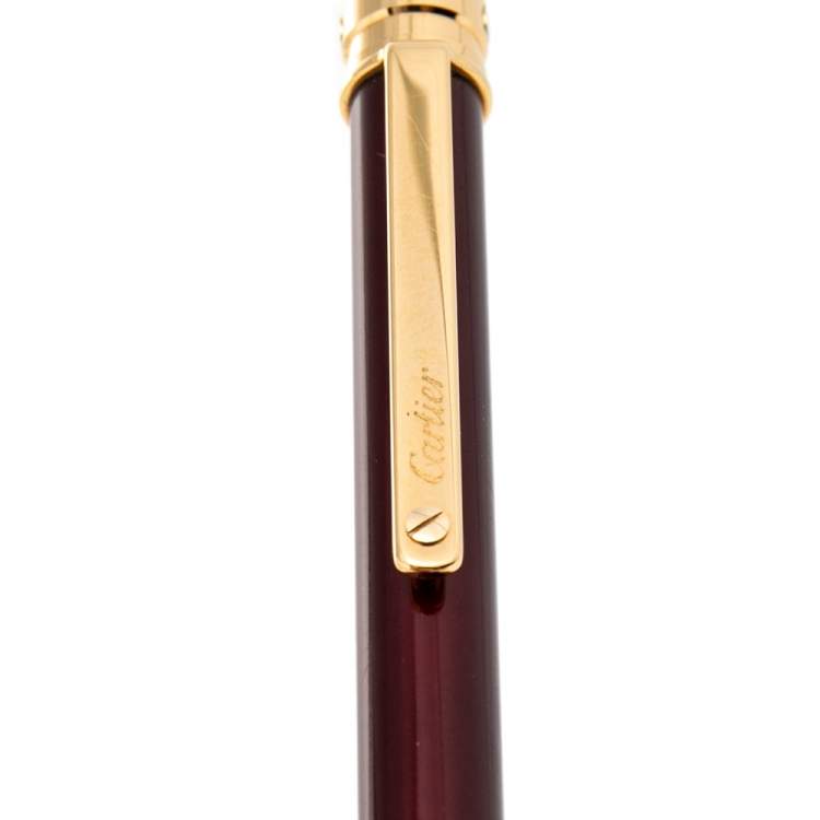 Pre Owned Cartier Gold Plated Burgundy Lacquer Santos de Cartier Ballpoint Pen