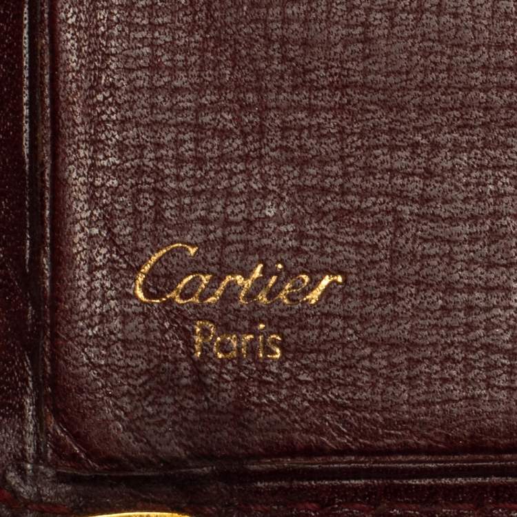 مملوكة مسبقًا Cartier Maroon Leather Must De Cartier 6CC Bifold Wallet