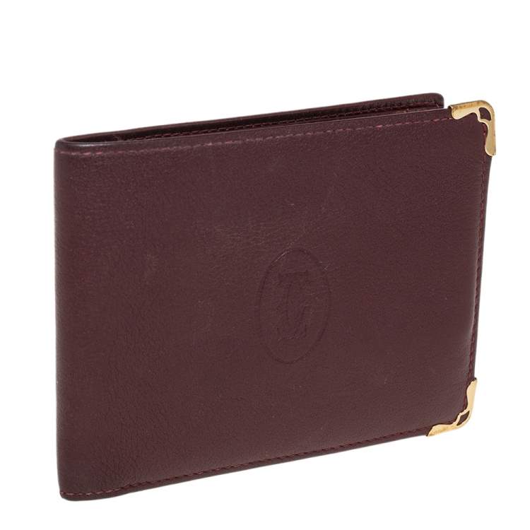 Pre Owned Cartier Maroon Leather Must De Cartier 6CC Bifold Wallet