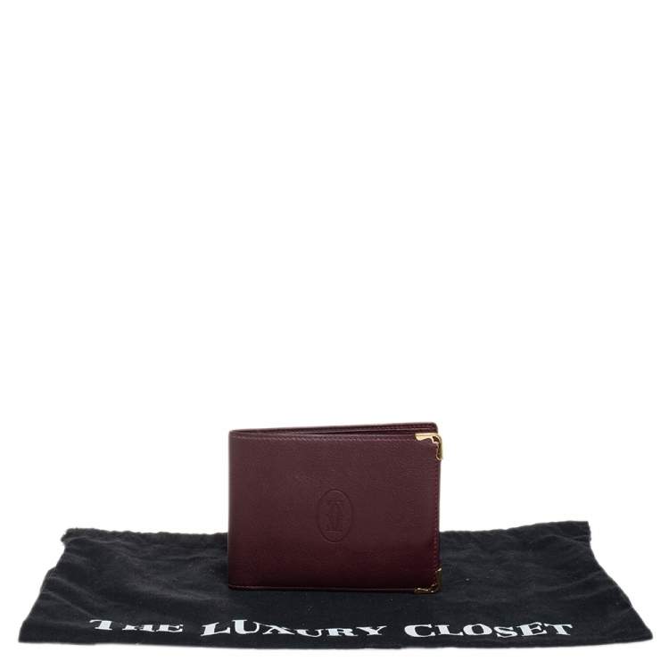 Pre Owned Cartier Maroon Leather Must De Cartier 6CC Bifold Wallet