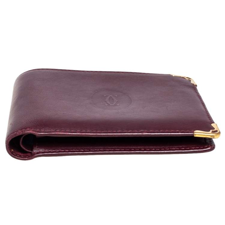 Pre Owned Cartier Maroon Leather Must De Cartier 6CC Bifold Wallet