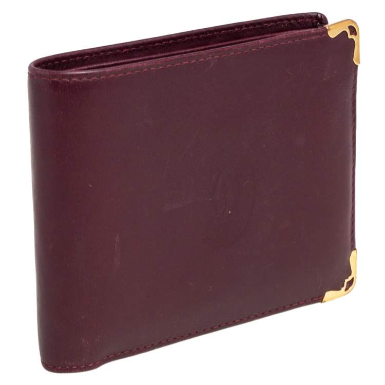 Pre Owned Cartier Maroon Leather Must De Cartier 6CC Bifold Wallet