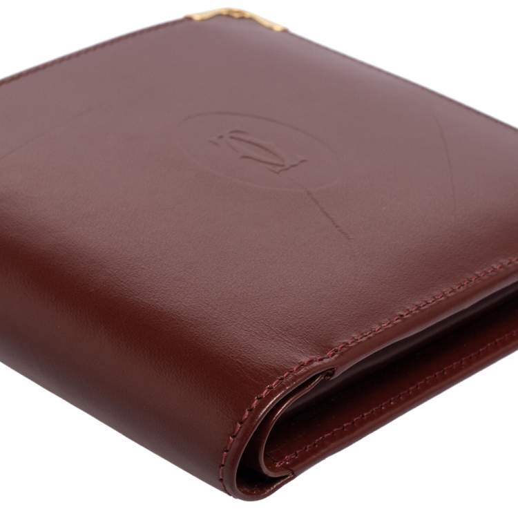 Pre Owned Cartier Maroon Leather Must De Cartier Bifold Wallet